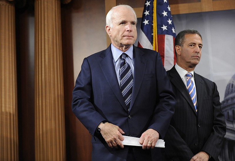 
              FILE - In this Jan. 7, 2009 file photo, Sen. John McCain, R-Ariz., left, and Sen. Russ Feingold, D-Wis., take part in a news conference on Capitol Hill in Washington. Forever linked by the seminal campaign finance law that bears their names, John McCain and Russ Feingold built their reputations in the Senate around their commitment to deflating the power and influence of special interest money in politics. But now, the two allies on campaign finance reform find themselves benefiting from the same sources of funding they once scorned. (AP Photo/Susan Walsh, File)
            