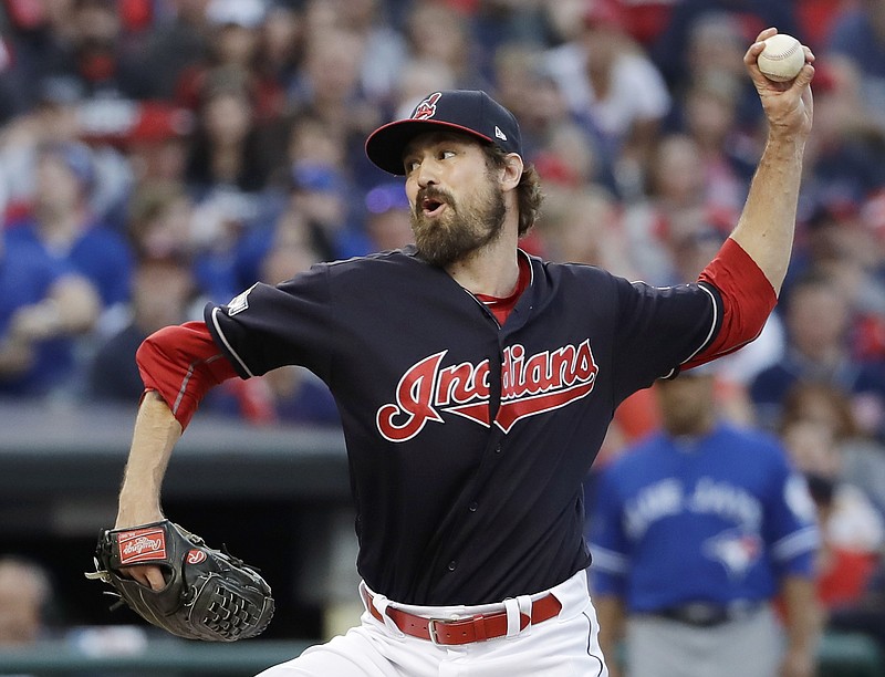 Cleveland Indians relief pitcher Andrew Miller throws against the Toronto Blue Jays during the seventh inning in Game 2 of baseball's American League Championship Series in Cleveland, Saturday, Oct. 15, 2016. (AP Photo/Matt Slocum)