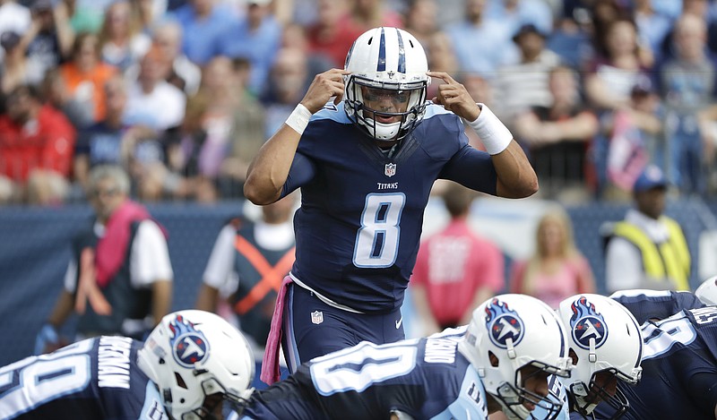 Tennessee Titans quarterback Marcus Mariota (8) calls a play against the Cleveland Browns in the first half of an NFL football game Sunday, Oct. 16, 2016, in Nashville, Tenn. (AP Photo/James Kenney)