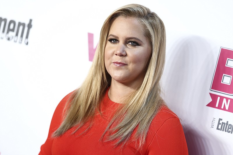 
              FILE - In this Nov. 15, 2015 file photo, Amy Schumer attends the VH1 Big In 2015 with Entertainment Weekly Award Show held at the Pacific Design Center in West Hollywood, Calif. Amy Schumer’s rant against Donald Trump apparently turned off some fans at her show in Tampa, Florida, Sunday, Oct. 16, 2016. The Tampa Bay Times reports a reporter counted about 200 people walked out over the comments. (Photo by John Salangsang/Invision/AP, File)
            