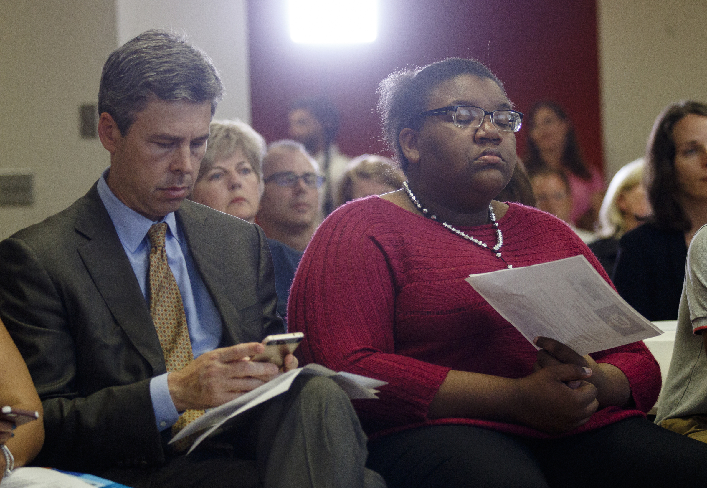 Mayor Andy Berke, left, sits next to Howard School student Natacha Peace during a forum hosted by the Times Free Press titled