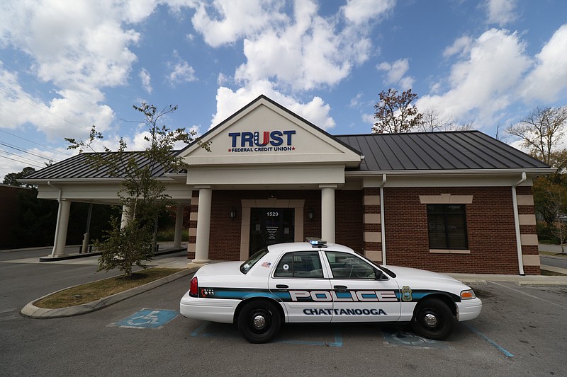 Police respond to an armed robbery call at the Trust Federal Credit Union off of Gunbarrel Rd on Tuesday afternoon.