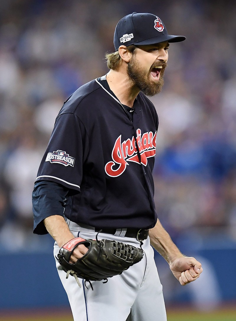 
              Cleveland Indians relief pitcher Andrew Miller celebrates after Toronto Blue Jays' Josh Donaldson hit into an inning-ending double play during sixth inning during Game 5 of baseball's American League Championship Series in Toronto, Wednesday, Oct. 19, 2016. (Frank Gunn/The Canadian Press via AP)
            