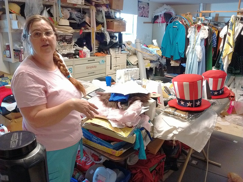 Susan Stringer, manager of Beauty and the Beast Costumes at 3708 Dayton Blvd. in Red Bank, sews costumes that she rents to customers in a back room of her sprawling store, which is two former residences joined together.