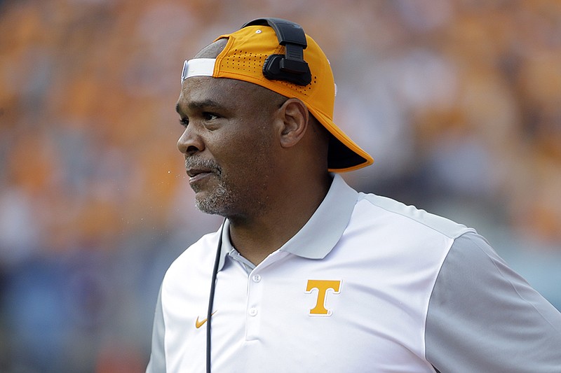 Tennessee linebackers coach Tommy Thigpen watches from the sideline in the first half of an NCAA college football game against Bowling Green Saturday, Sept. 5, 2015, in Nashville, Tenn. (AP Photo/Mark Humphrey)