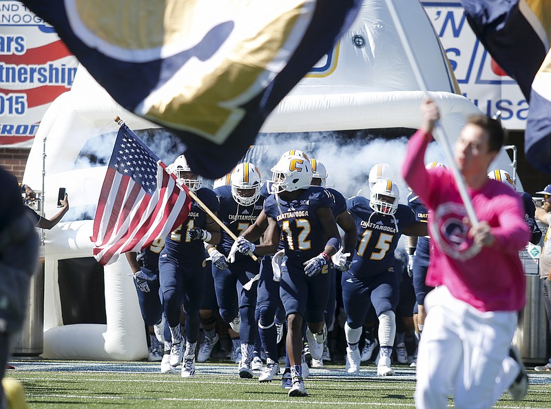 The UTC team takes the field for the Mocs' home football game against the VMI Keydets at Finely Stadium on Saturday, Oct. 22, 2016, in Chattanooga, Tenn.