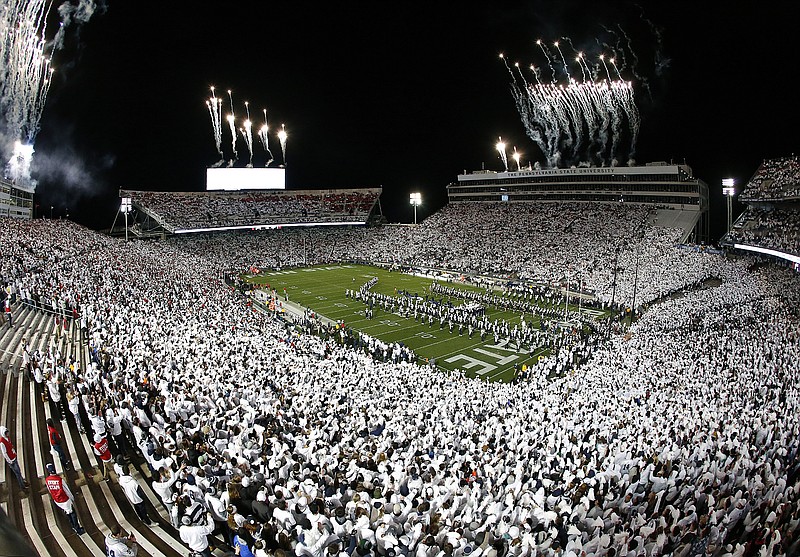 
              The band plays on the field before an  NCAA college football game between Ohio State and Penn State in State College, Pa., Saturday, Oct. 22, 2016. (AP Photo/Chris Knight)
            