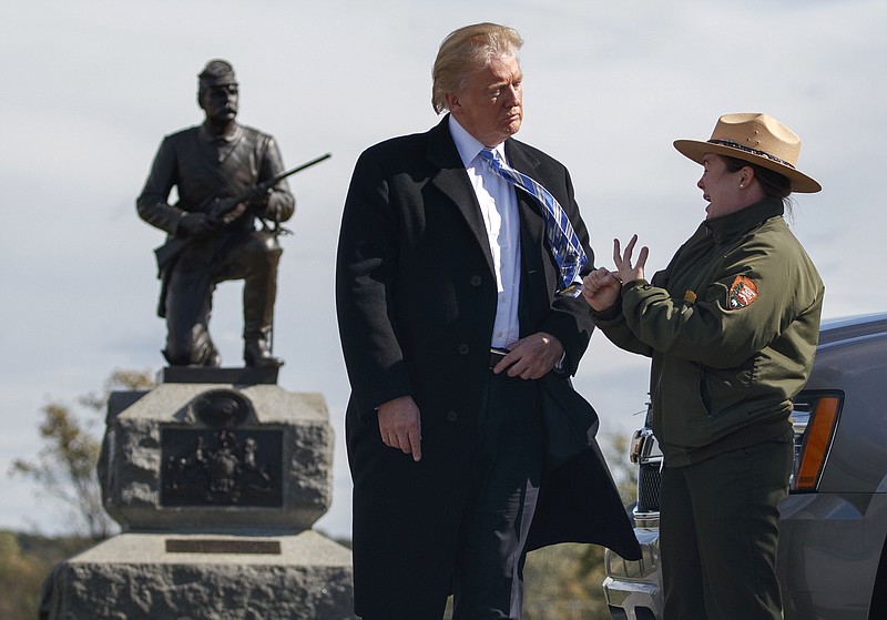 
              Interpretive park ranger Caitlin Kostic speaks to Republican presidential candidate Donald Trump as she gives him a tour at Gettysburg National Military Park Saturday, Oct. 22, 2016, in Gettysburg, Pa. (AP Photo/ Evan Vucci)
            