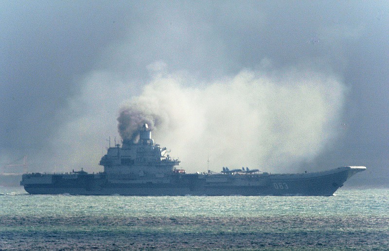 
              The Russian aircraft carrier Admiral Kuznetsov passes within a few miles of Dover, in the southeast of England as a fleet of Russian warships sail through the North Sea, and the English Channel  Friday Oct. 21, 2016. Britain is sending warships to watch a Russian aircraft carrier group and other vessels as they sail through the North Sea and the English Channel. Defense Secretary Michael Fallon said Thursday, that the military will watch "every step of the way." (Gareth Fuller/PA Wire
            