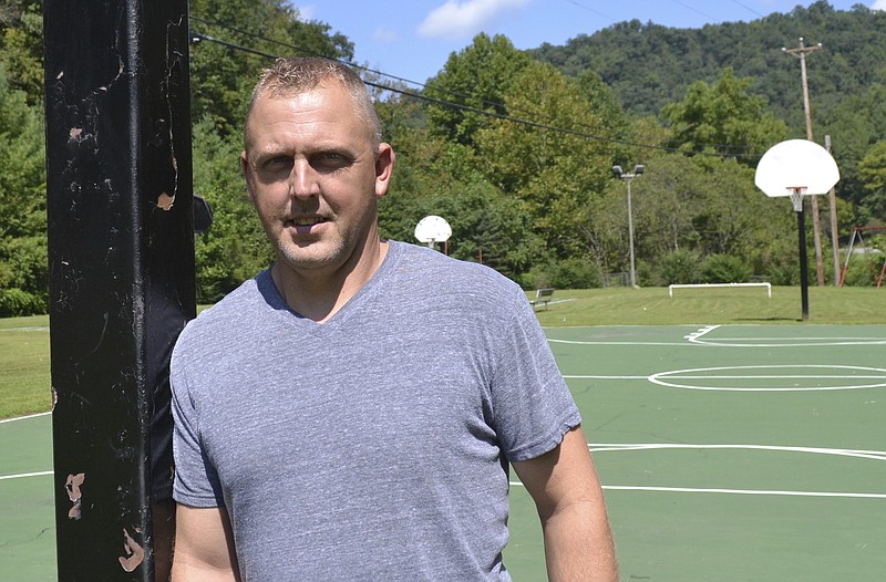 
              In this Aug. 31, 2016 photo, Knott County's parks director, Chris Amburgey, is pictured at one of the county's parks in Redfox, Ky. Amburgey has taken on several other jobs as the county struggles to pay its bills amid a decline in the coal industry. A company owned by West Virginia gubernatorial candidate Jim Justice owes more than $2 million in taxes to the county. (AP Photo/Dylan Lovan)
            