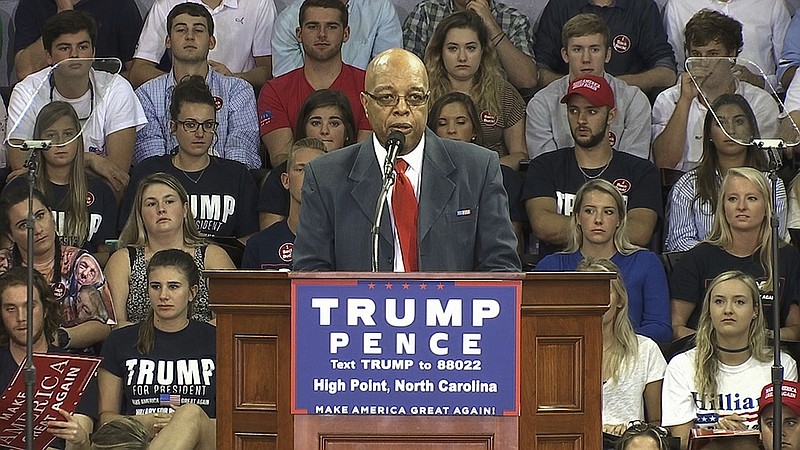 
              In this Tuesday, Sept. 20, 2016, image made from video, Clarence Henderson, a participant in the Feb. 1, 1960, sit-in at a Greensboro, N.C., Woolworth lunch counter, speaks at a campaign event in High Point, N.C., in support of Republican presidential candidate Donald Trump. Henderson has been criticized for his stance, with many taking to Twitter to accuse him of abandoning the principles he fought so hard for more than half a century ago. (AP Photo/Alex Sanz)
            