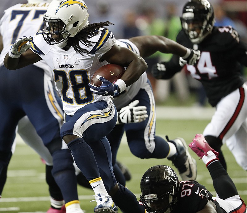 
              San Diego Chargers running back Melvin Gordon (28) runs against the Atlanta Falcons during the first half of an NFL football game, Sunday, Oct. 23, 2016, in Atlanta. (AP Photo/John Bazemore)
            