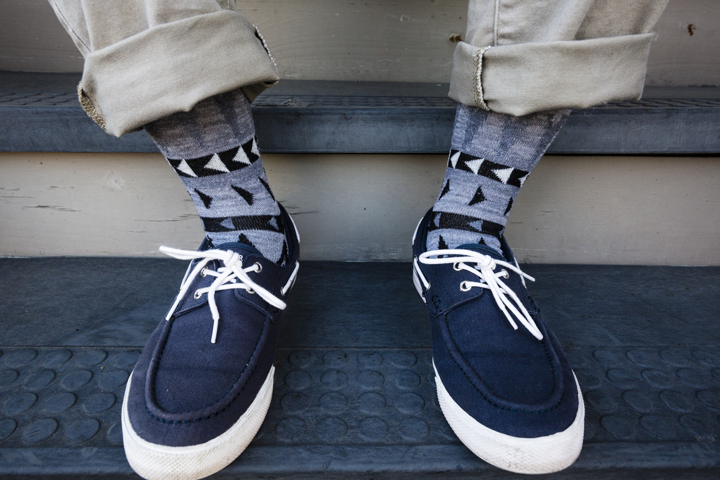 Navy is a trendy sock color for men currently, says Goodhew and Sockwell co-owner Jim Markley. Local Alex Green shows off the trend with some of his personal socks.