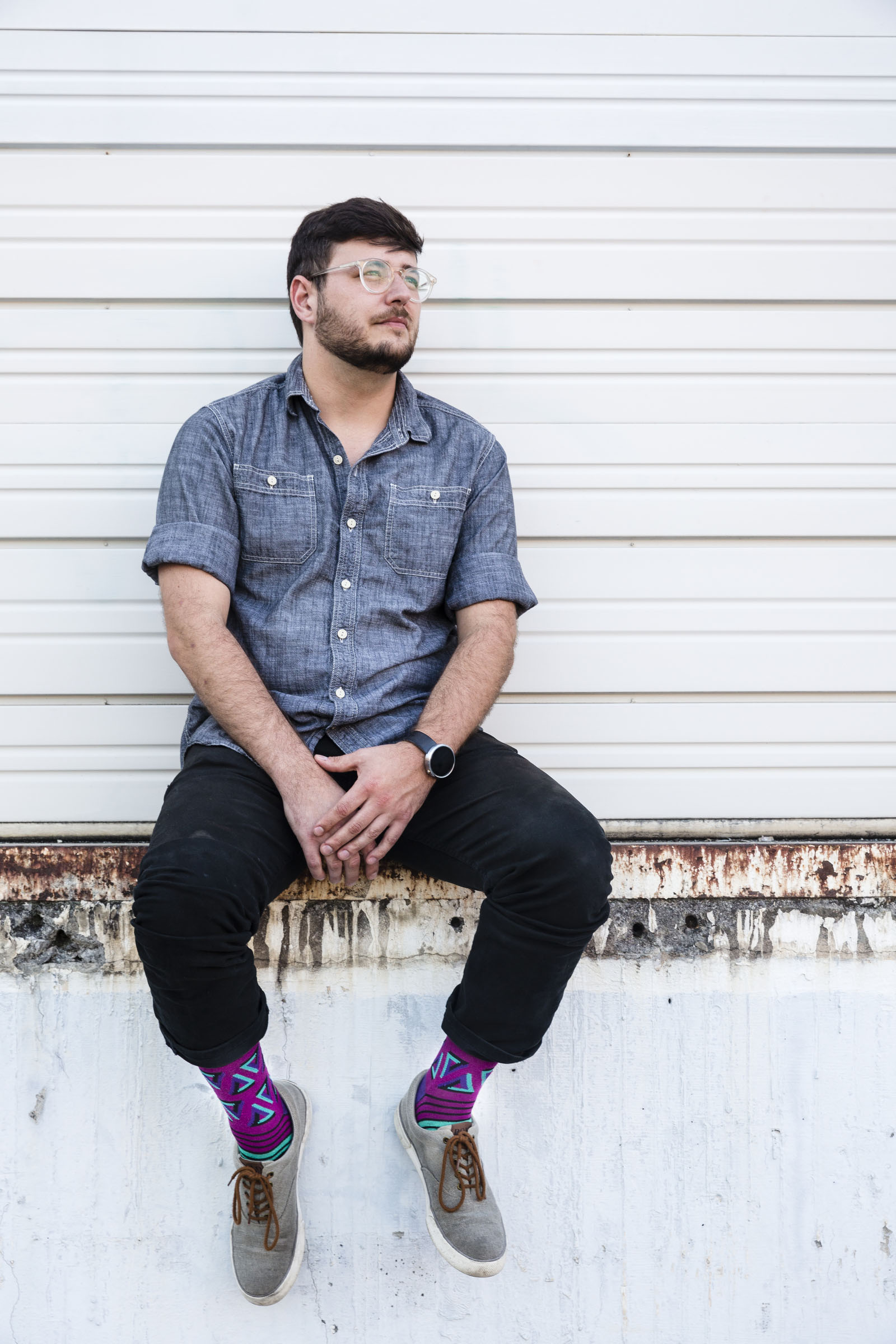 Local computer technician Donald Sayers shows off his socks — and personality.