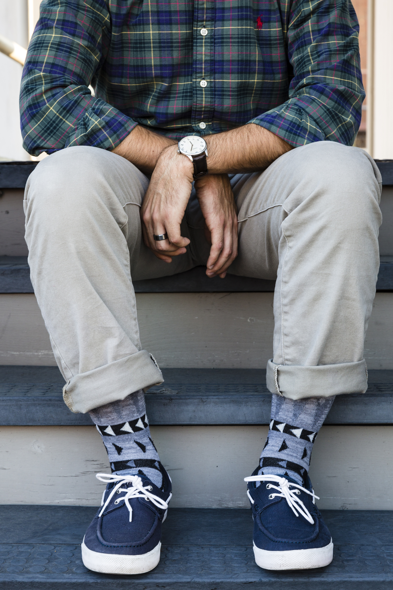 Navy is a trendy sock color for men currently, says Goodhew and Sockwell co-owner Jim Markley. Local Alex Green shows off the trend with some of his personal socks.