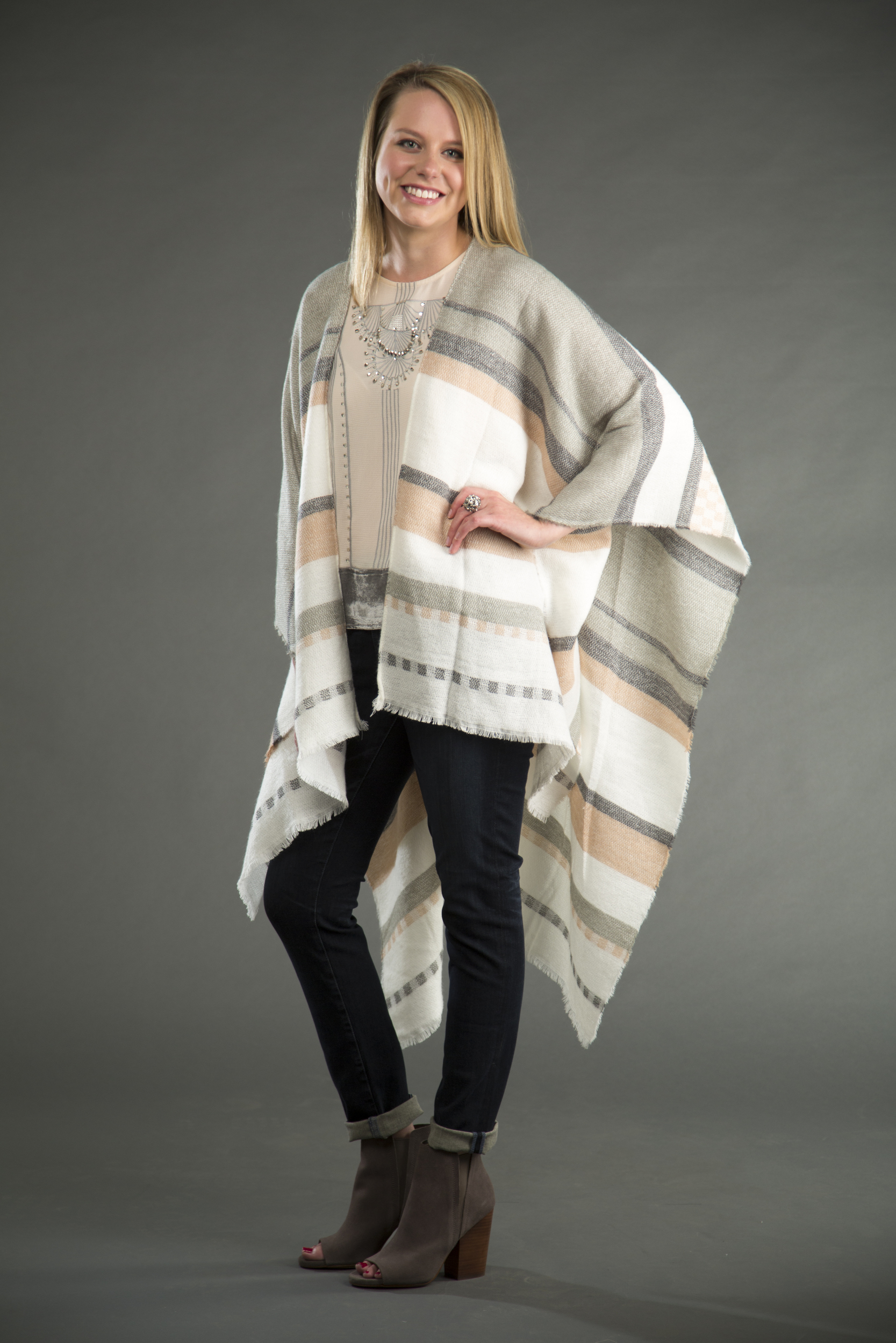 Gentle Fawn kimono, available at Merch Northshore. Esley embellished sleeveless top, available at Fab'rik. Adriano Goldschmied cigarette jean, available at Yacoubian Tailors. Splendid taupe booties, available at Verde.