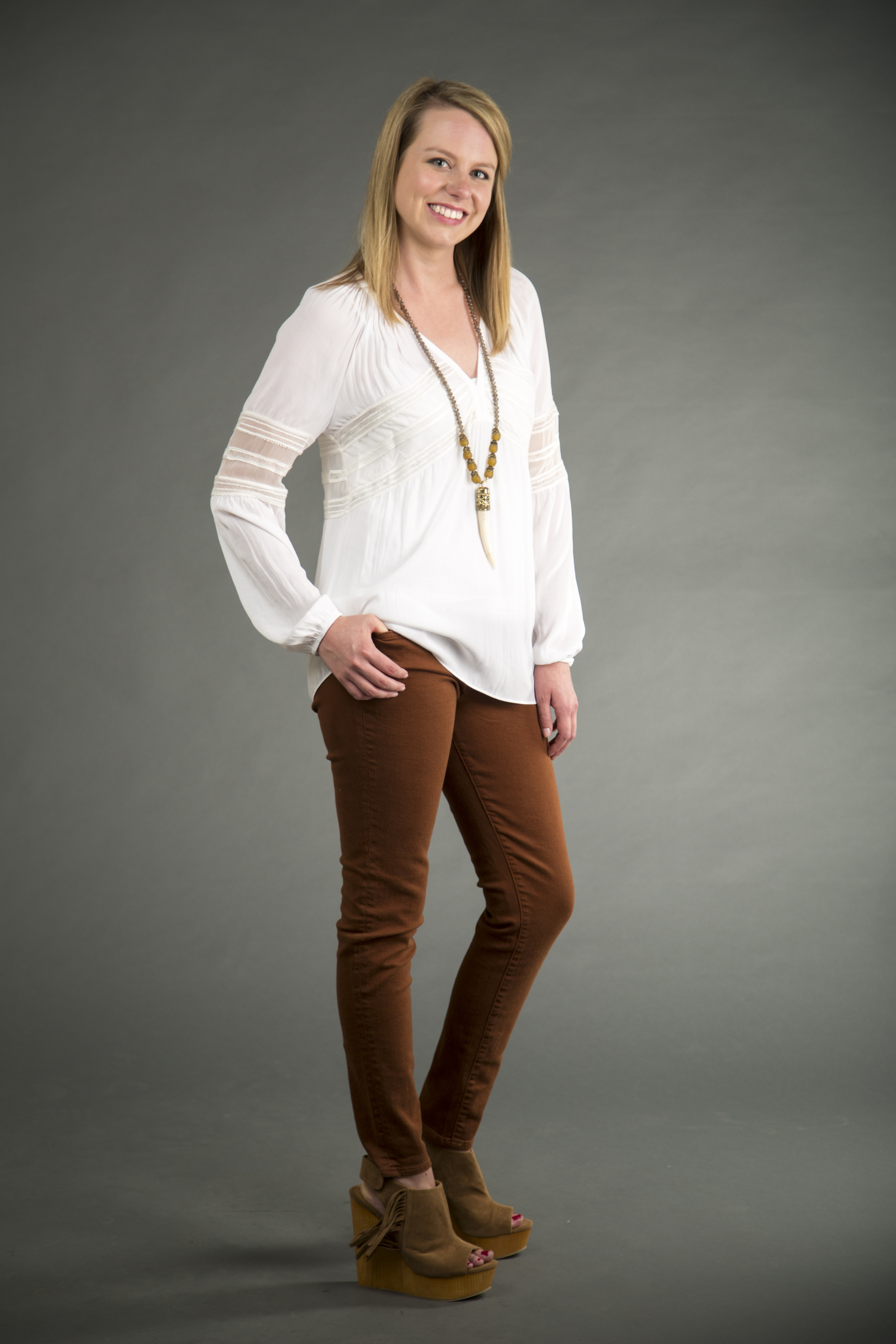 Ramy Brook peasant top, available at Alice Blue. Principle rust colored jean, available at Verde. Fabulina Designs horn necklace, available at Merch Northshore. Olivia Miller fringe wedges, available at Fab'rik.