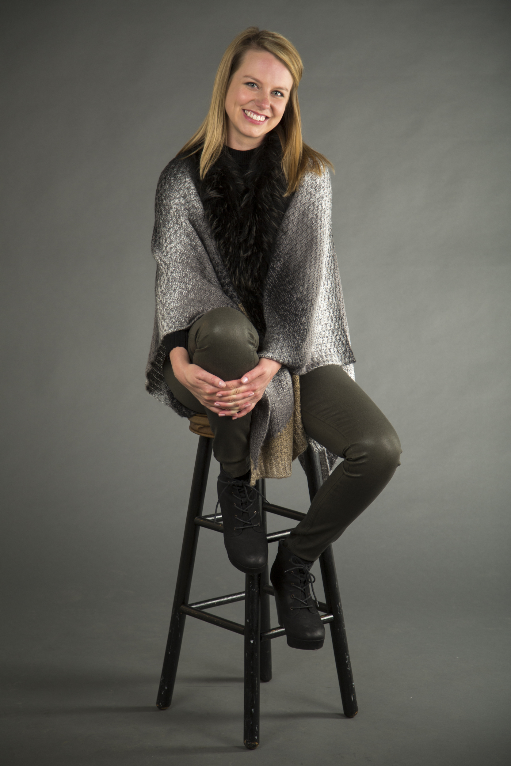 Linda Richards fur-trim shawl, available at Yacoubian Tailors. Paige Verdugo ultra-skinny coated jean, available at Alice Blue.