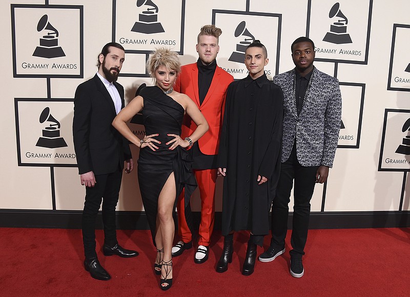 
              FILE - In this Monday, Feb. 15, 2016, file photo, Avi Kaplan, from left, Kirstin Maldonado, Scott Hoying, Mitch Grassi and Kevin Olusola of Pentatonix arrive at the 58th annual Grammy Awards at the Staples Center in Los Angeles. Grammy winners Pentatonix will sing the opening theme song for NBC’s “Thursday Night Football.” NBC said Tuesday, Oct. 25, that Pentatonix will sing the track “Weekend Go.” It was inspired from the a cappella group’s original song “Sing” off their 2015 self-titled album. (Photo by Jordan Strauss/Invision/AP, File)
            