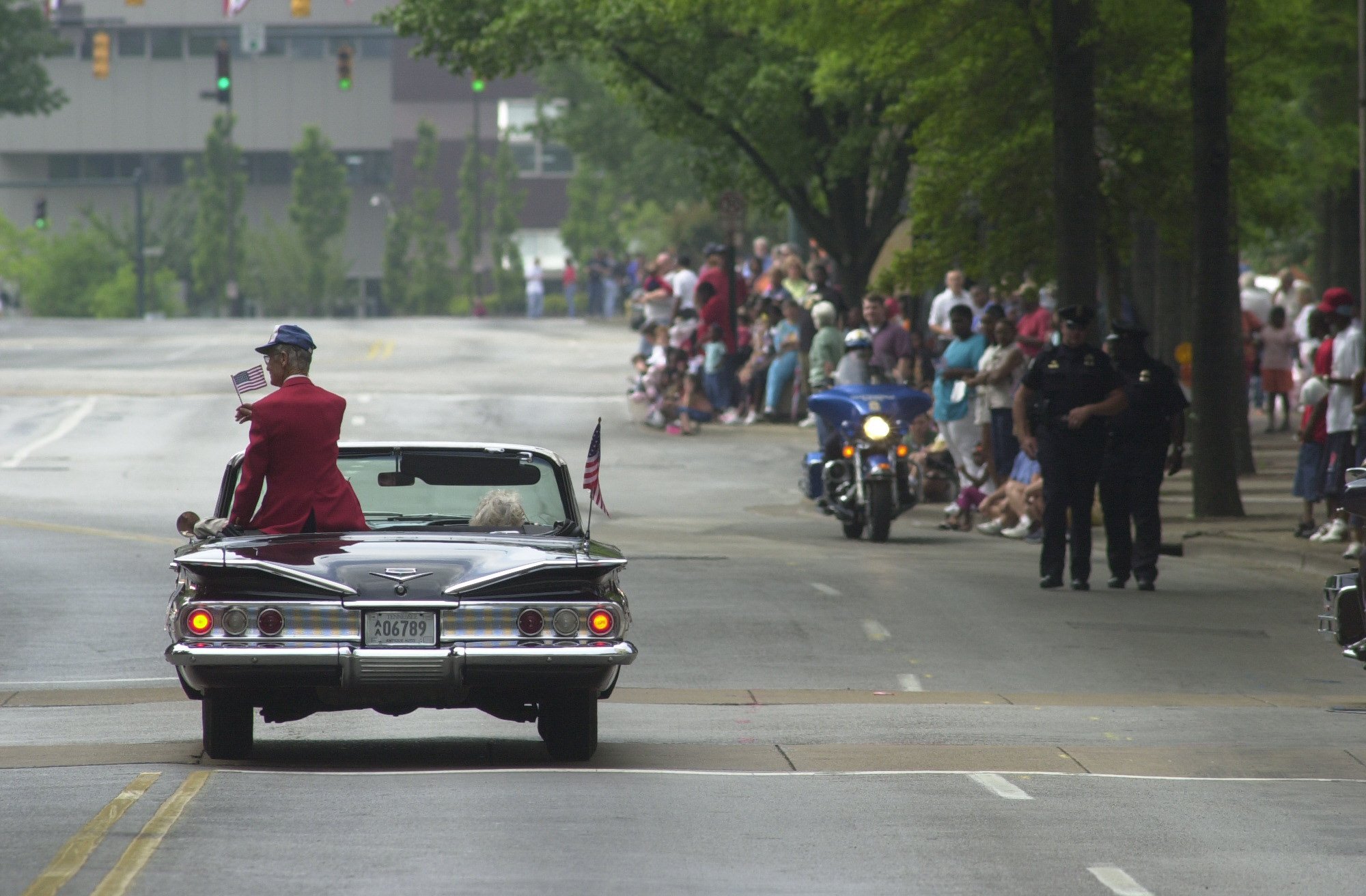World War II veteran and Medal of Honor recipient Desmond Doss rides in a car past the grand stand on Market St. during an Armed Forces parade in downtown Chattanooga in 2002. Doss was awarded the Medal of Honor for his role in Okinawa as an Army medic.