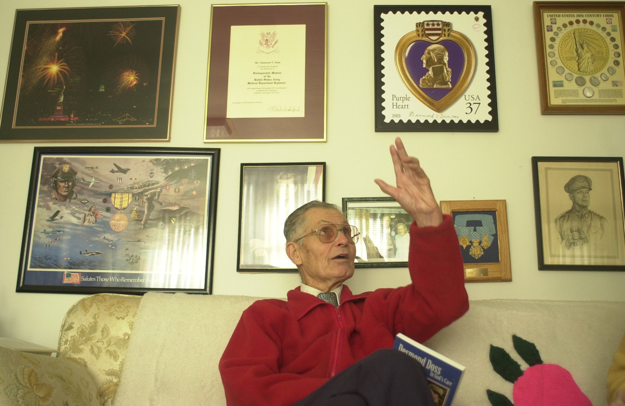 Desmond Doss, a Medal of Honor recipient, talks about his time in World War II in his Lookout Mountain home.