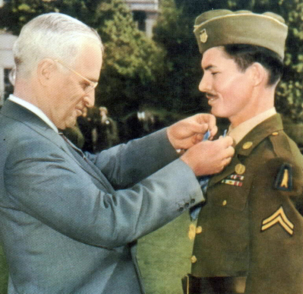Desmond Doss receives the Congressional Medal of Honor from President Harry S. Truman