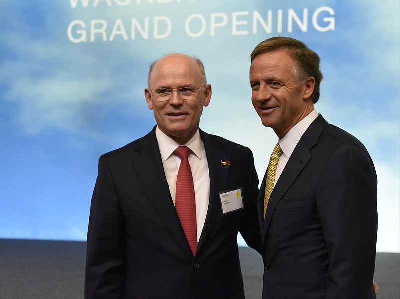 Tennessee Gov. Bill Haslam poses for a photograph with Dr. Rudolf Staudigl (CQ), president and CEO of the German-based Wacker Chemie, as Wacker opens its $2.5 billion plant in Charleston, Tenn., — the biggest private investment ever in Southeast Tennessee.