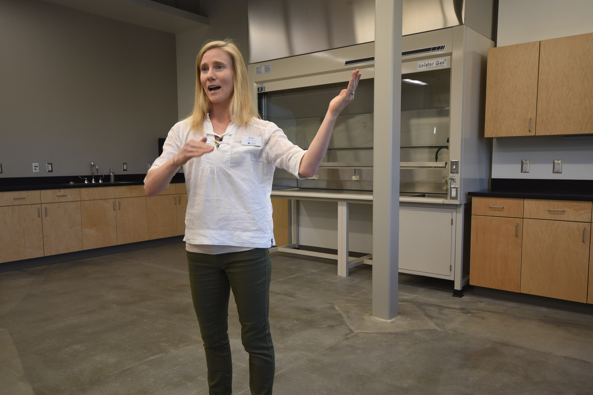 Water Shed Educator Erin Durant talks to a group inside the Flex Lab at the newly built Tennessee Aquarium Conservation Institute on the Tennessee River near the Baylor School campus.