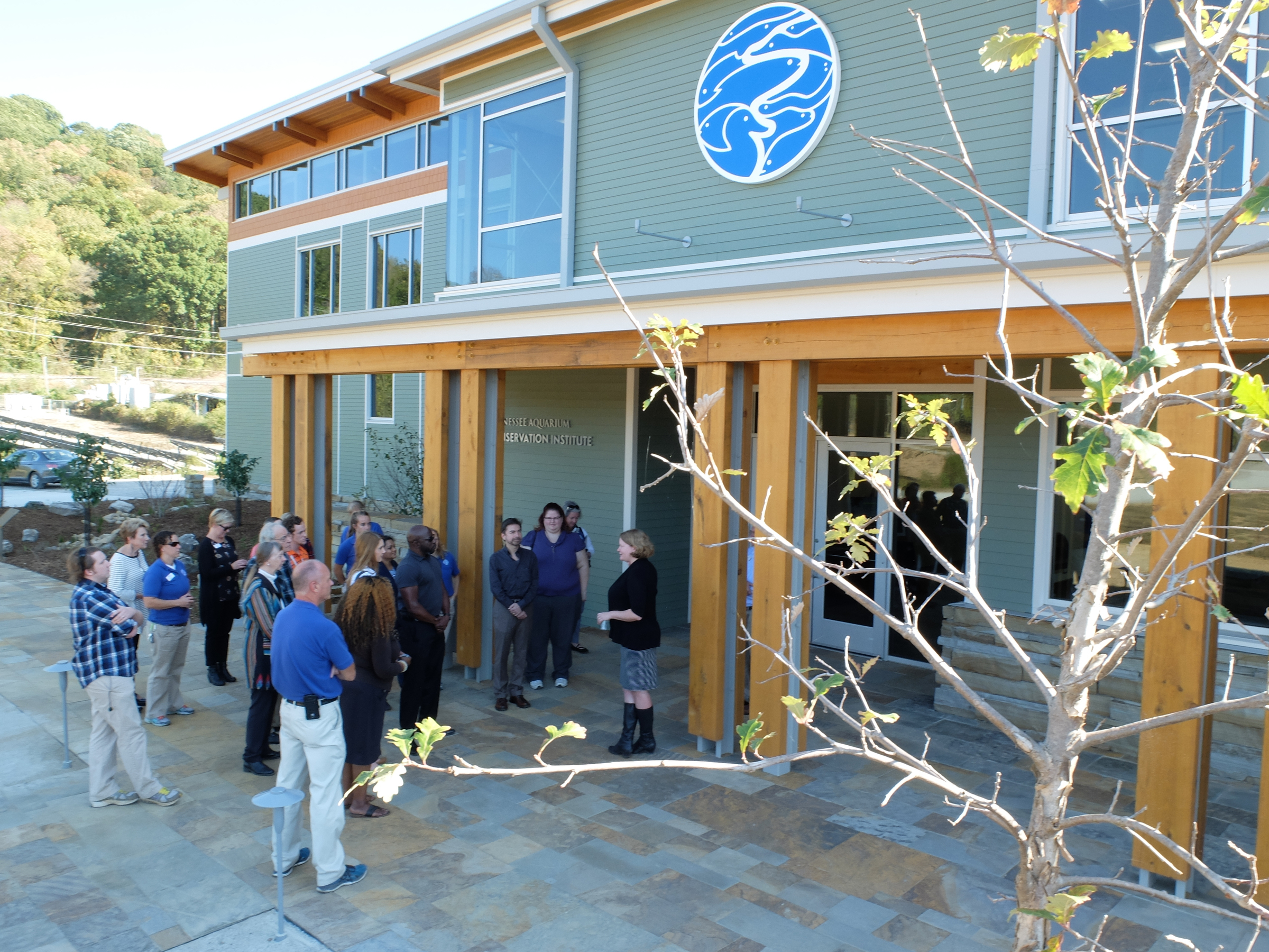 Tennessee Aquarium Conservation Institute Dr. Anna George, talks to the first invited tour group to see the new institute on Monday adjacent to the Baylor School campus.