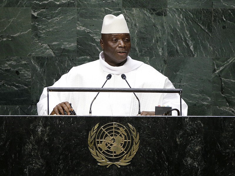 
              FILE - In this Sept. 25, 2014, file photo, Gambia's President Yahya Jammeh addresses the 69th session of the United Nations General Assembly at the United Nations headquarters. A third African country, Gambia, says it will leave the International Criminal Court as fears grow of a mass pullout from the body that pursues some of the world's worst atrocities. Gambia announced the decision on television Tuesday, Oct. 25, 2016, accusing the court of unfairly targeting Africa and calling it the "International Caucasian Court." (AP Photo/Frank Franklin II, File)
            