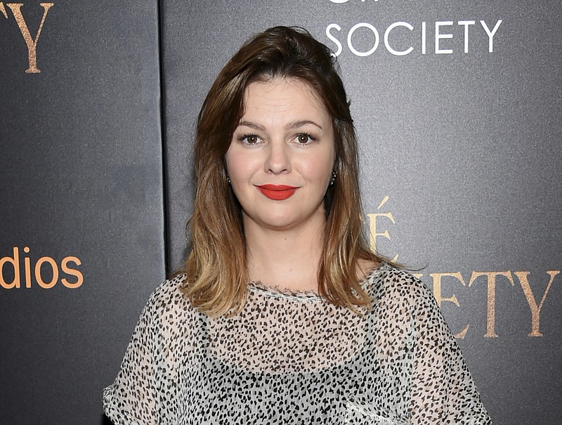 
              FILe - In this July 13, 2016 file photo, actress Amber Tamblyn attends the premiere of Amazon Studio and Liongate's "Cafe Society", in New York. Tamblyn says she is expecting a baby girl. The 33-year-old actress wrote in an essay for "Glamor" magazine that she is “going to be a mother soon. I'm pregnant, with a daughter on the way.”  (Photo by Evan Agostini/Invision/AP, File)
            