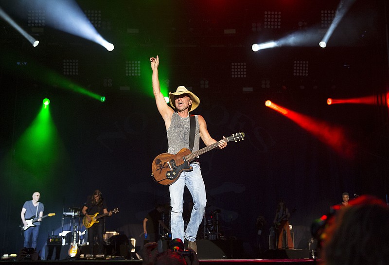 
              FILE - In this April 3, 2016, file photo, Kenny Chesney performs at the 4th Annual ACM Party for a Cause Festival at the Las Vegas Festival Grounds in Las Vegas. Chesney will receive the Pinnacle Award during the 50th annual Country Music Association Awards, joining Garth Brooks and Taylor Swift as the only recipients. The CMA Awards will air live from the Bridgestone Arena in Nashville on Nov. 2 on ABC. (Photo by Eric Jamison/Invision/AP, File)
            