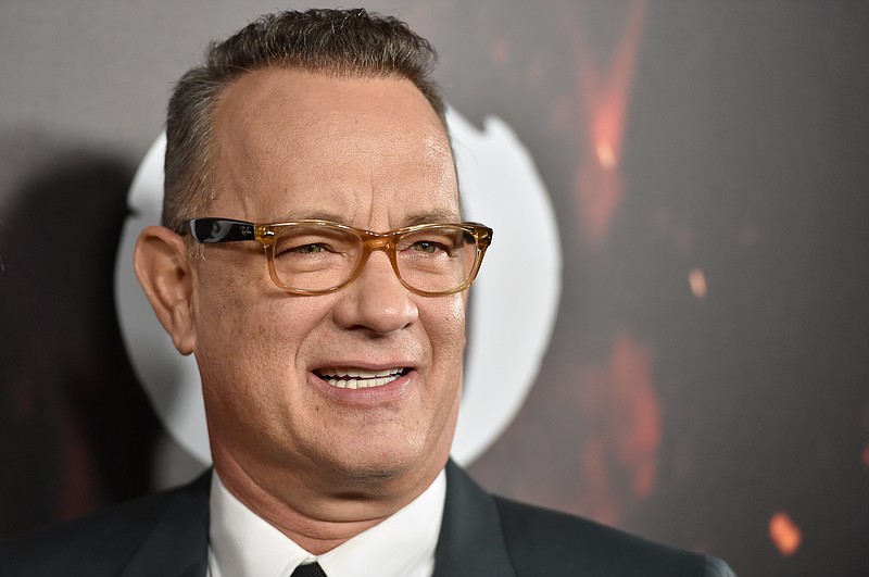 
              Tom Hanks arrives at a special screening of "Inferno" at the Directors Guild of America Theatre on Tuesday, Oct. 25, 2016, in Los Angeles. (Photo by Jordan Strauss/Invision/AP)
            