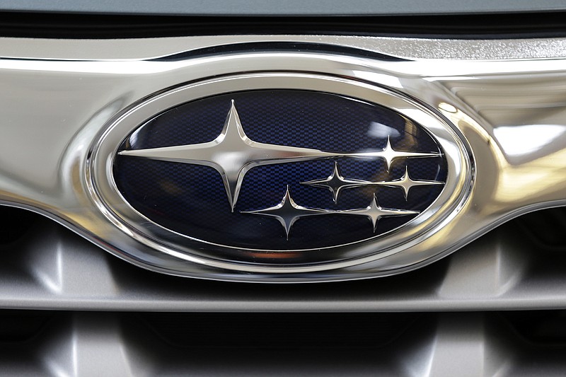 
              FILE - This Feb. 14, 2013, file photo shows a Subaru logo on the grill of a Subaru automobile at the Pittsburgh Auto Show in Pittsburgh. Subaru announced Wednesday, Oct. 26, 2016, the company is recalling more than 100,000 of its top-selling models in the U.S. because a turbocharger air pump can run continuously, overheat and could cause fires. (AP Photo/Gene J. Puskar, File)
            