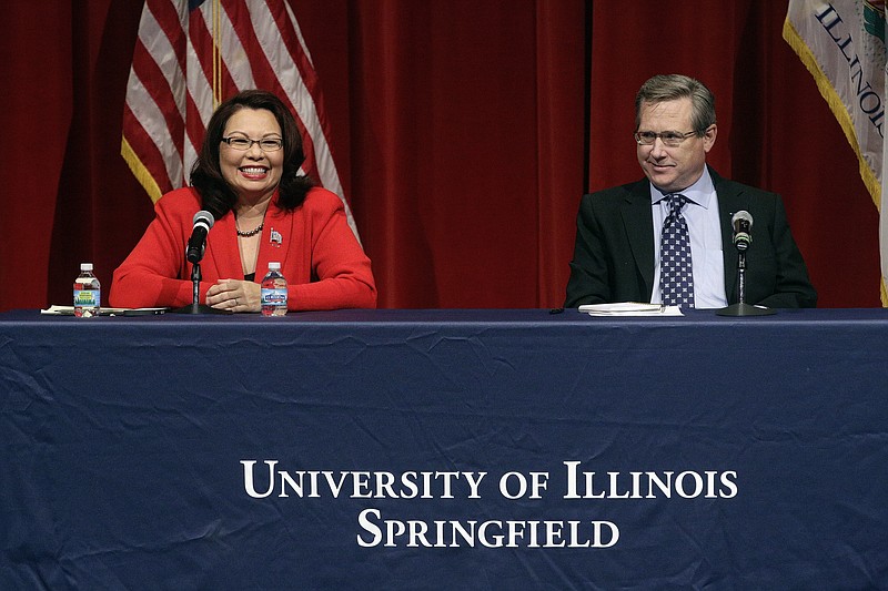 Republican U.S. Sen. Mark Kirk, right, and Democratic U.S. Rep. Tammy Duckworth, left, face off in their first televised debate in what's considered a crucial race that could determine which party controls the Senate, Thursday, Oct. 27, 2016, at the University of Illinois in Springfield, Ill. (AP Photo/Seth Perlman)