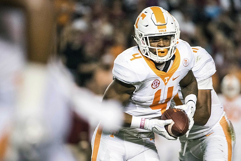 Tennessee running back John Kelly carries the ball during the first half of an NCAA college football game against South Carolina Saturday, Oct. 29, 2016, in Columbia, S.C. (AP Photo/Sean Rayford)