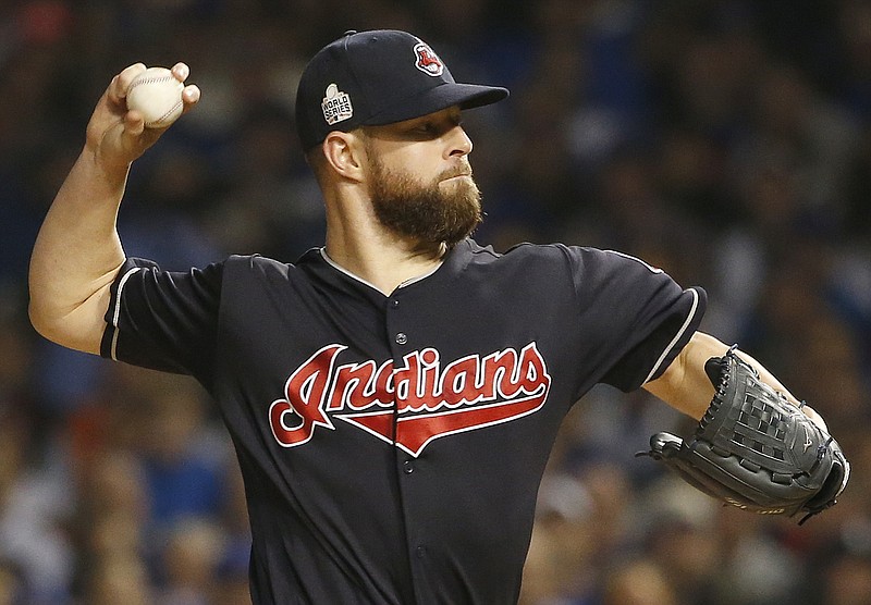 
              Cleveland Indians starting pitcher Corey Kluber throws during the first inning of Game 4 of the Major League Baseball World Series against the Chicago Cubs, Saturday, Oct. 29, 2016, in Chicago. (AP Photo/Nam Y. Huh)
            