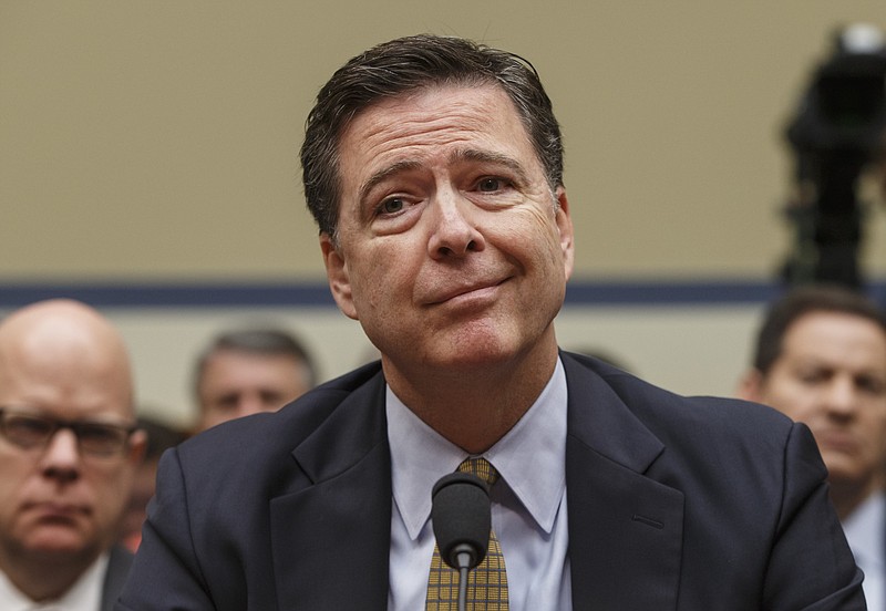 FBI Director James Comey testifies in July under oath before the House Oversight Committee to explain his agency's recommendation to not prosecute Hillary Clinton over her private email setup. (AP Photo/J. Scott Applewhite)