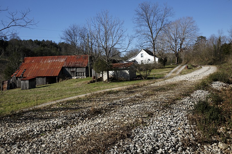 Farmland is seen adjacent to the Eureka Trail on Wednesday, Jan. 13, 2016, in McMinn County, Tenn. The trail is being formed from an old railway corridor as a Rails to Trails greenway project.