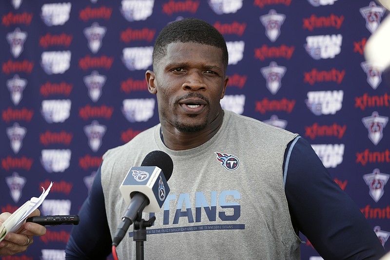 FILE - In this July 30, 2016, file photo, Tennessee Titans wide receiver Andre Johnson answers questions after NFL football training camp, in Nashville, Tenn. Titans wide receiver Andre Johnson, a seven-time Pro Bowl selection, is retiring at the age of 35. The Titans issued a release Monday, Oct. 31, 2016, announcing Johnson's retirement. (AP Photo/Mark Humphrey, File)