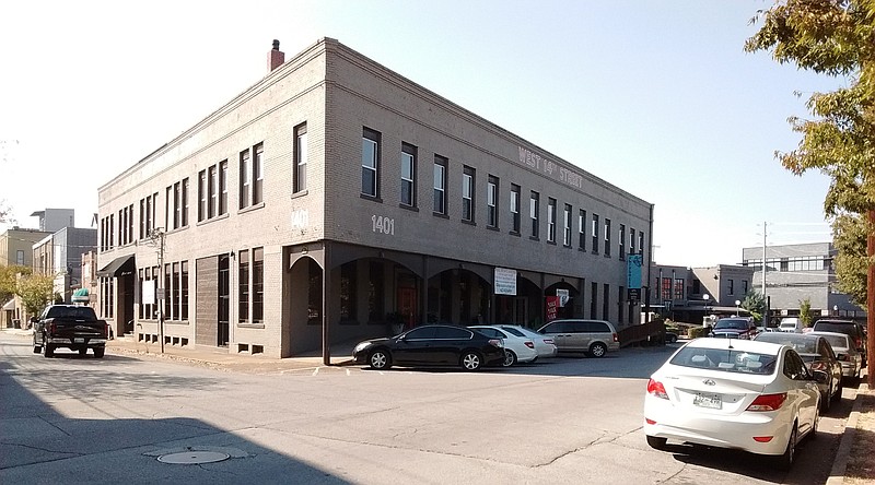 This historic loft warehouse building on Chattanooga's Southside at 1401 Williams St. that's been home to Southside Antiques for 21 years will be auctioned at 6 p.m. Thursday.