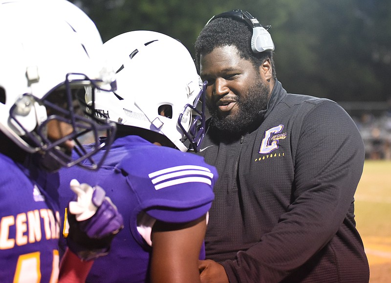 Central head coach Cortney Braswell encourages Jaheim Jones on the sideline Friday night after a play against Hixson.