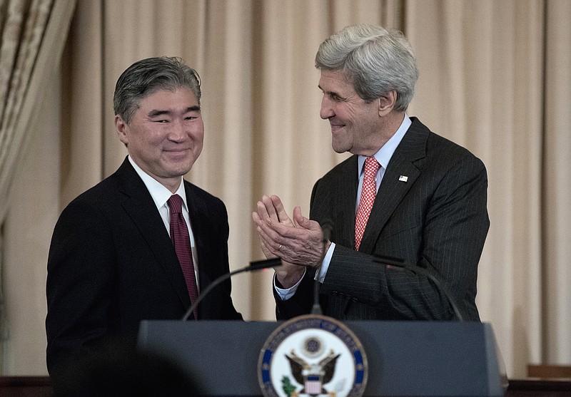 
              Secretary of State John Kerry applauds after swearing in Sung Kim, left, as U.S. Ambassador to Philippines, Thursday, Nov. 3, 2016, at the State Department in Washington.  (AP Photo/Carolyn Kaster)
            