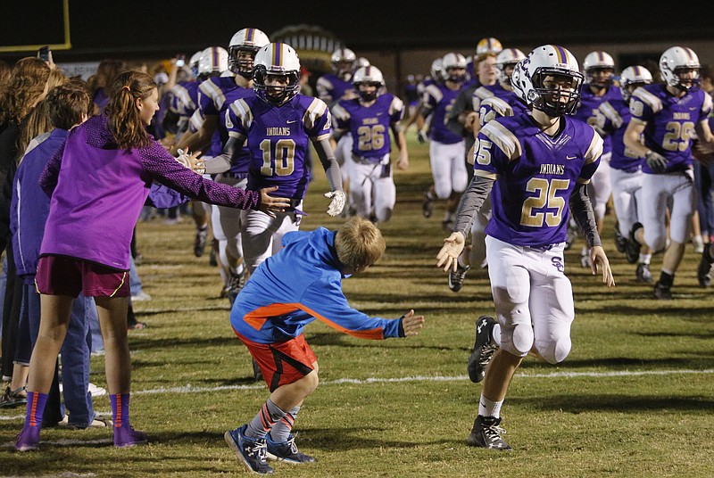 The Sequatchie County football team takes the field for their TSSAA first-round playoff football game against Howard at Sequatchie County High School in Dunlap, Tenn.