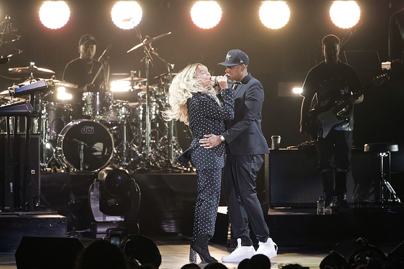               Jay Z and Beyonce perform during a campaign rally for Democratic presidential candidate, Hillary Clinton, in Cleveland, Friday, Nov. 4, 2016. (AP Photo/Matt Rourke)
            