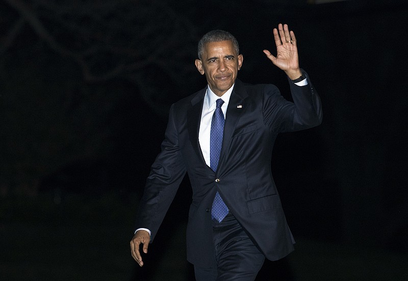 
              President Barack Obama waves upon arrival to the White House in Washington, Thursday, Nov. 3, 2016, from a campaign event in support of Democratic presidential candidate Hillary Clinton in Jacksonville, Fla. (AP Photo/Manuel Balce Ceneta)
            