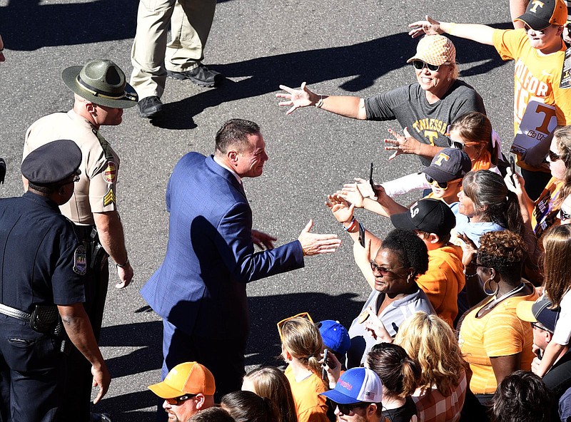 Tennessee head coach Butch Jones is greeted by fans during the Vol Walk.  The Tennessee Tech Golden Eagles visited the Tennessee Volunteers in NCAA football action at Neyland Stadium in Knoxville on November 5, 2016.