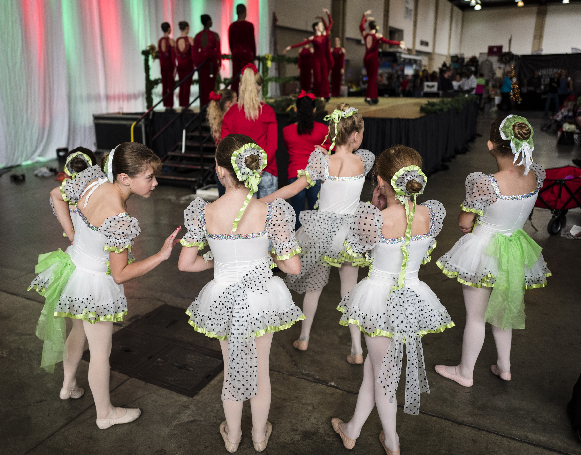 Dancers with Ballet Tennessee watch as older dancers perform at the Times Free Press's HoHo Expo at the Chattanooga Convention Center on Saturday, Nov. 5, 2016, in Chattanooga, Tenn. The holiday expo features more than 200 vendors as well as children's entertainment and continues Sunday.