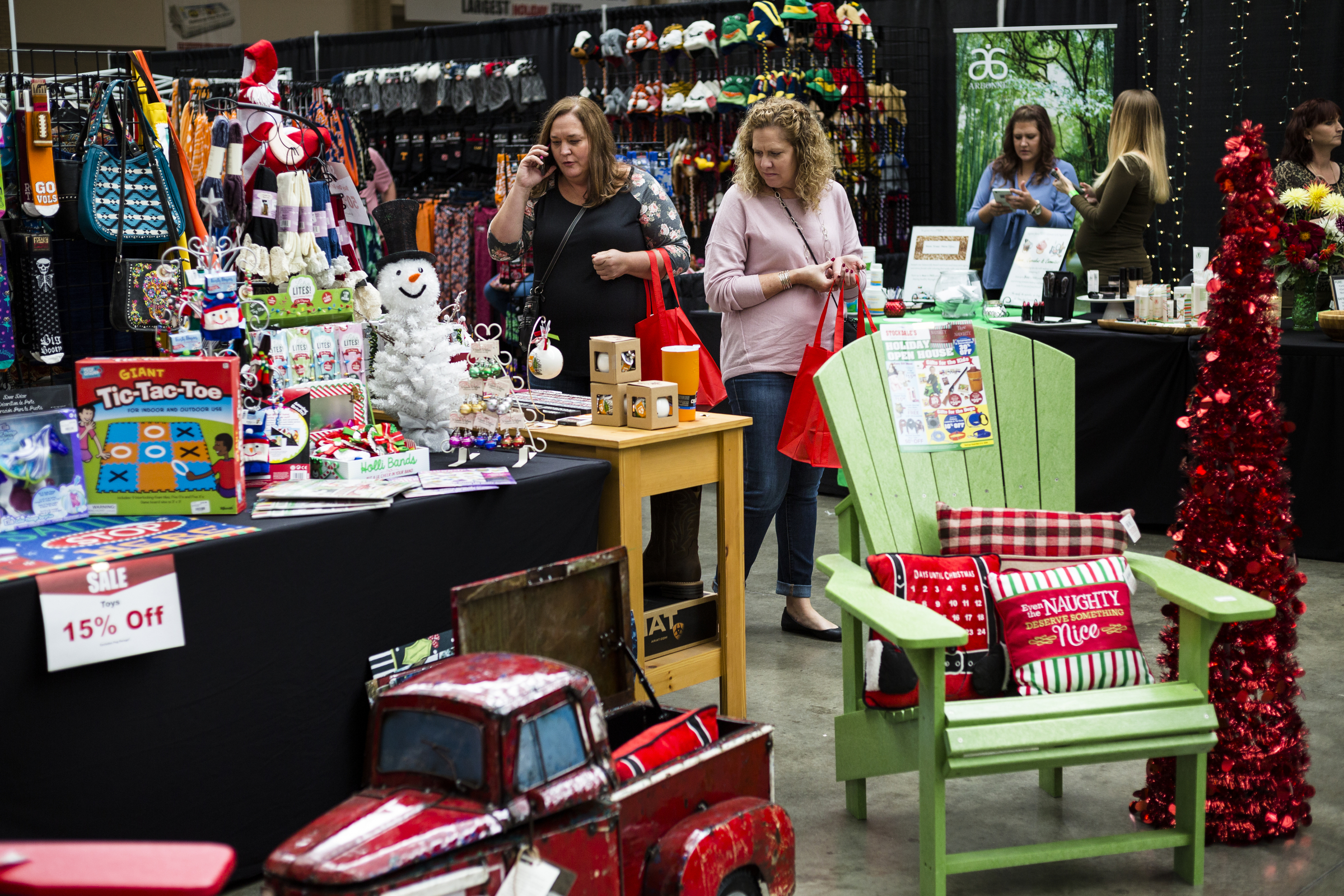People shop at the Times Free Press's HoHo Expo at the Chattanooga Convention Center on Saturday, Nov. 5, 2016, in Chattanooga, Tenn. The holiday expo features more than 200 vendors as well as children's entertainment and continues Sunday.