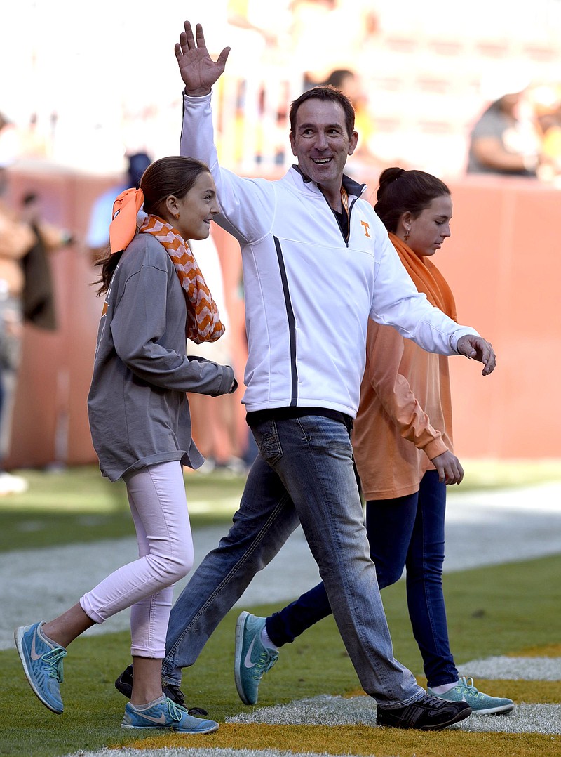 Former Tennessee great John Becksvoort was honored before the game. With Becksvoort is his two daughters, Jane and Kate.